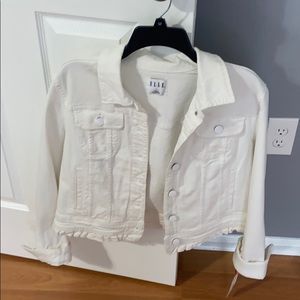 Woman’s white jean jacket